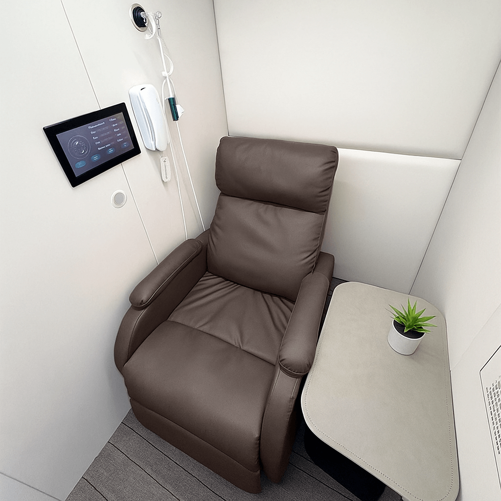 single brown chair in pod