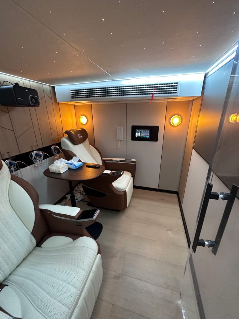 A Woodgrain and white hyperbaric chamber